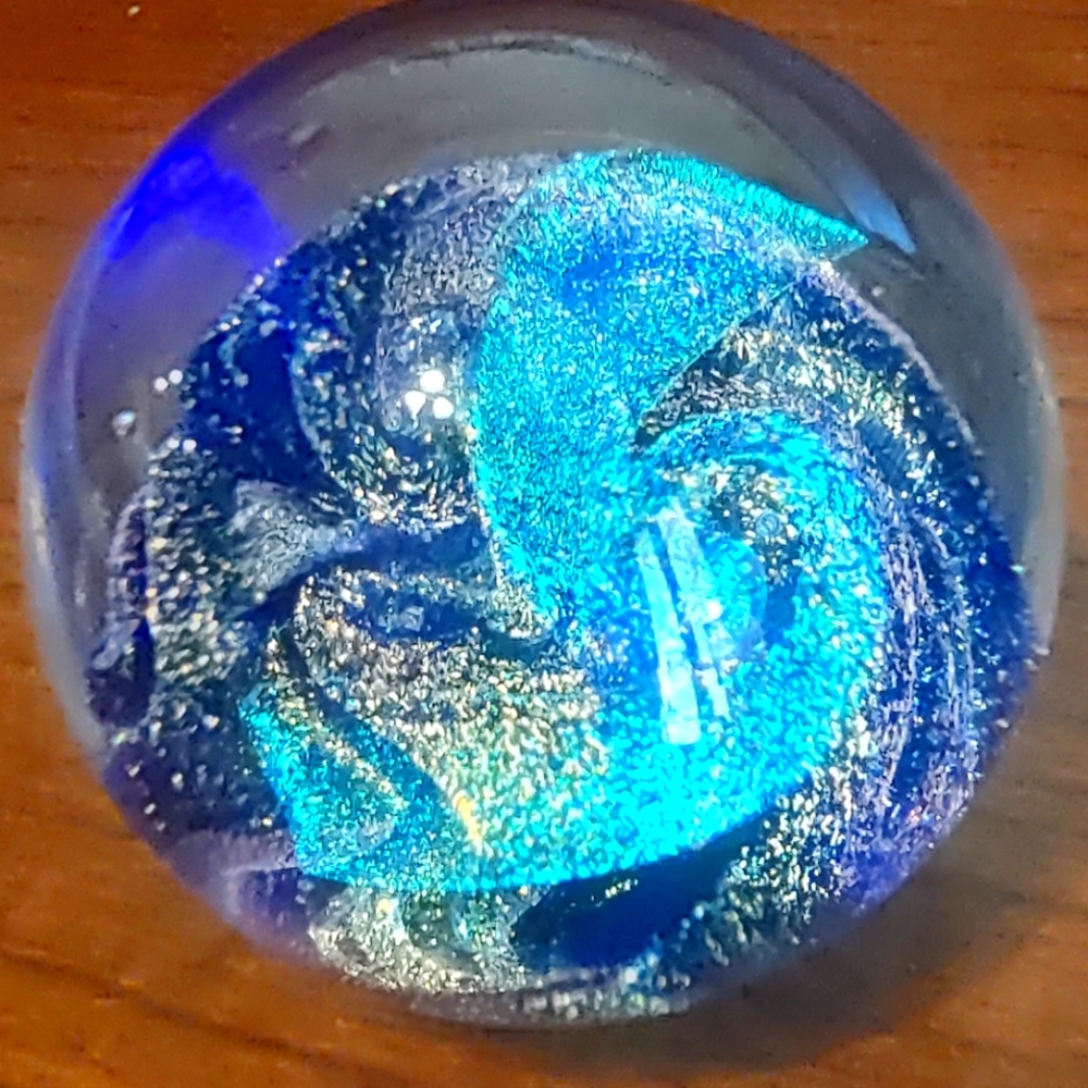 "Northern Lights" Glass Eye Studio 92 paperweight from the celestial collection.